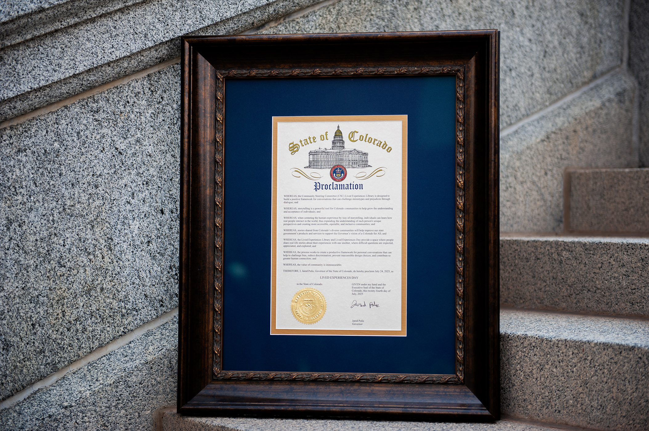 A framed 2025 Lived Experiences Day Proclamation