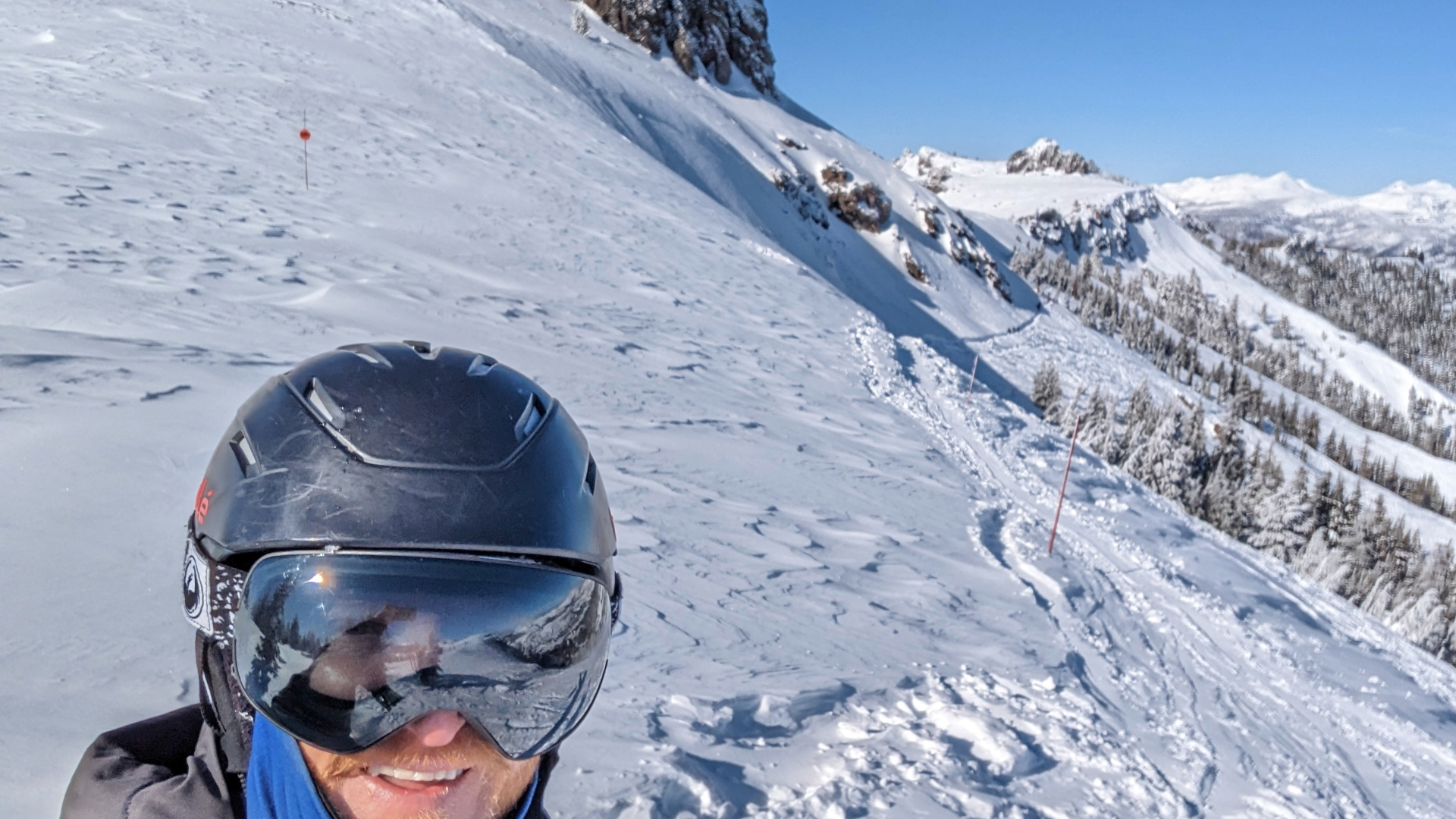 Brian Stafford on the side of a mountain in his ski gear
