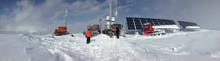 Digital Trunked Radio towers in the snow on top of a mountain